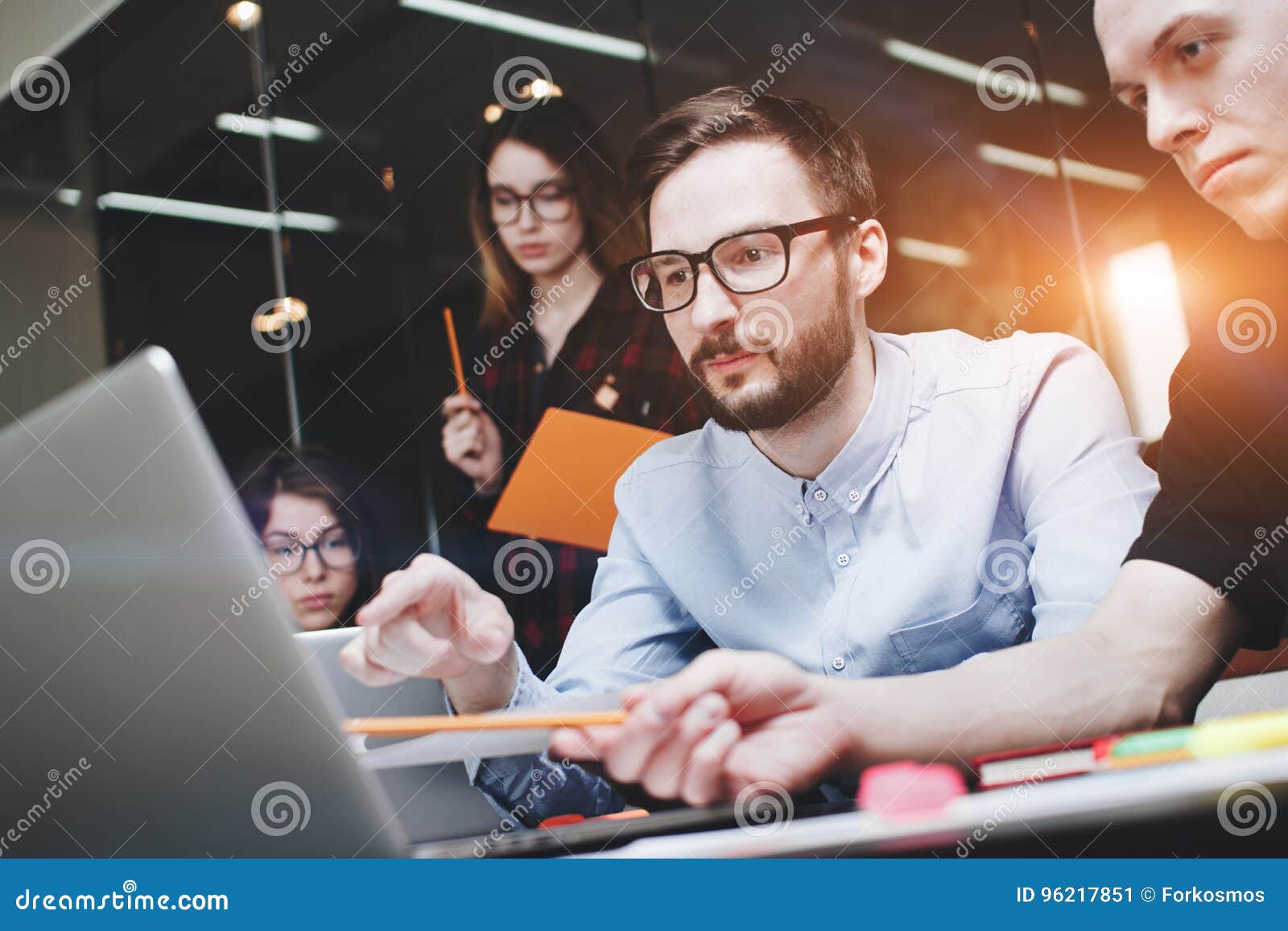 business people brainstorm concept. generic  notebook on wood table, papers, documents. team of businessmen are thinking ove