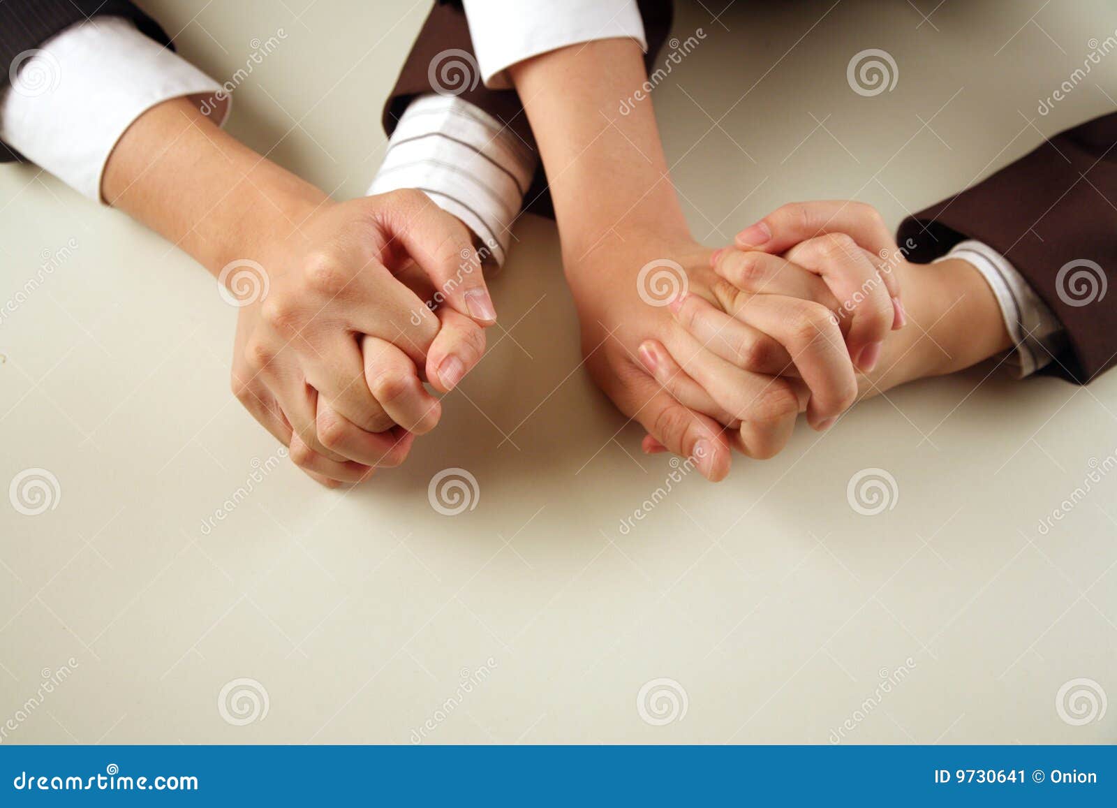 Business People With Hands Intertwined Stock Image Image 9730641