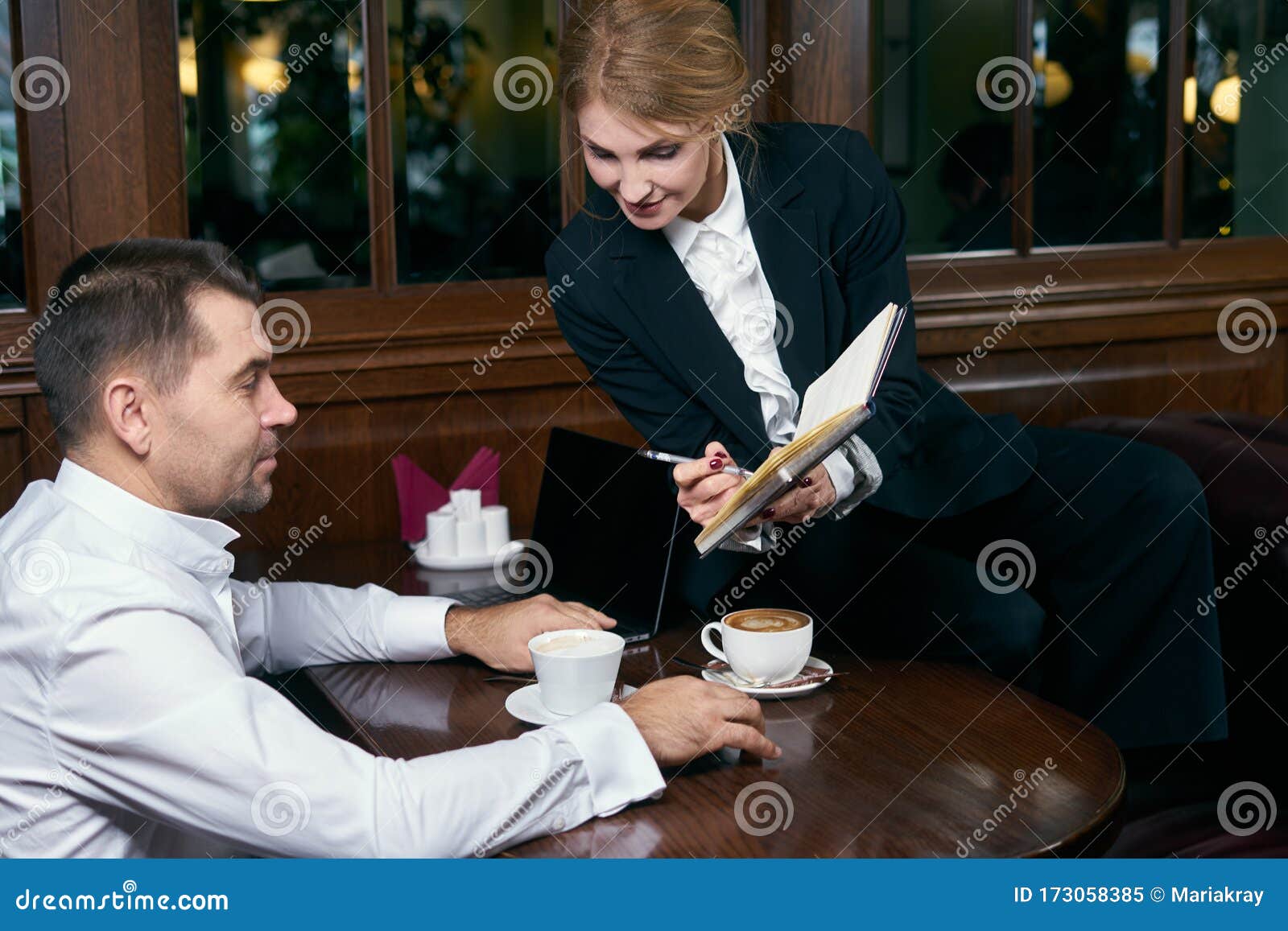 Business People Talking Over Coffee in Cafe Stock Image Image of