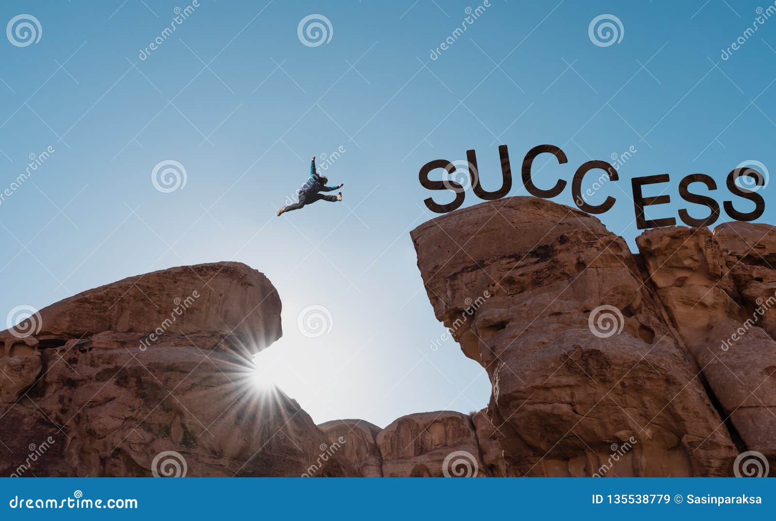 business success, challenge, achievement and leadership concept. silhouette a man jumping over precipice to success