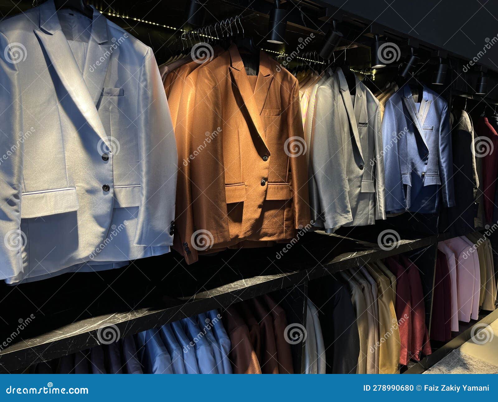 Business Suit Shop Selling Premium Expensive Suits Hang in a Row on ...