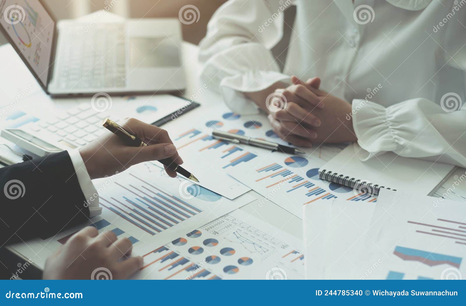 business team analyzing income charts and graphs with modern laptop computer. close up.business analysis and strategy concept