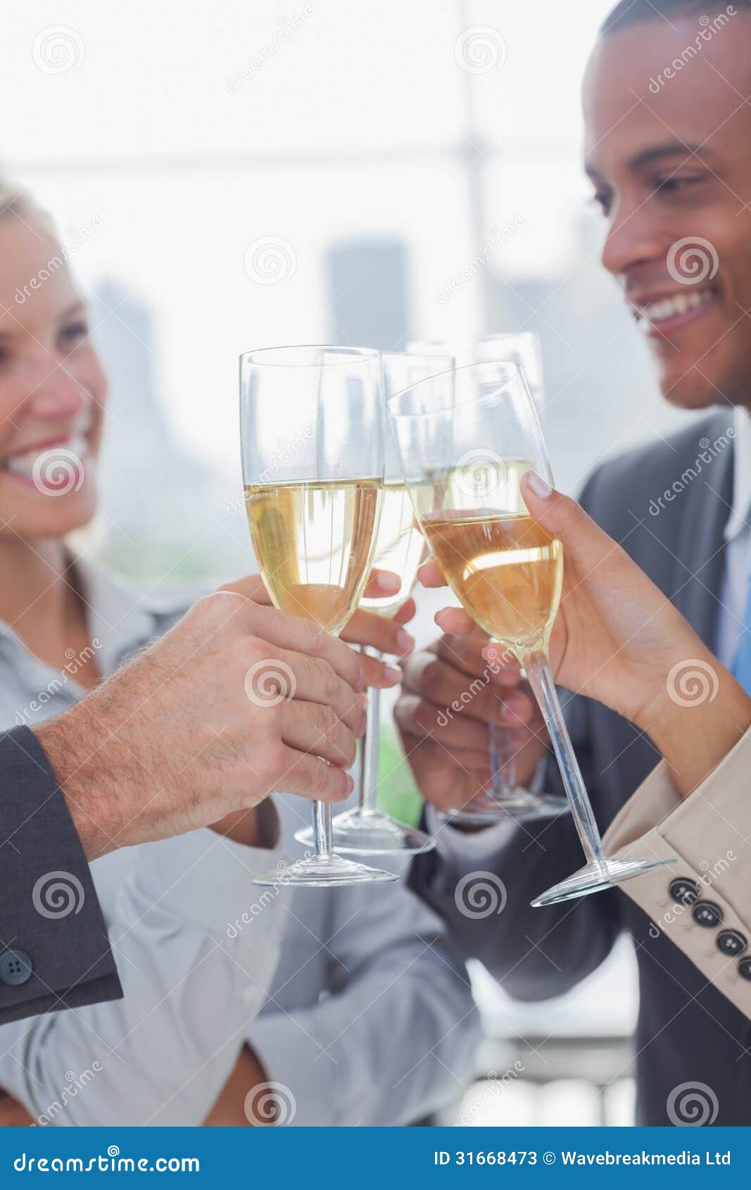 Business Team Celebrating With Champagne And Clinking Glasses Stock Image Image Of Flute