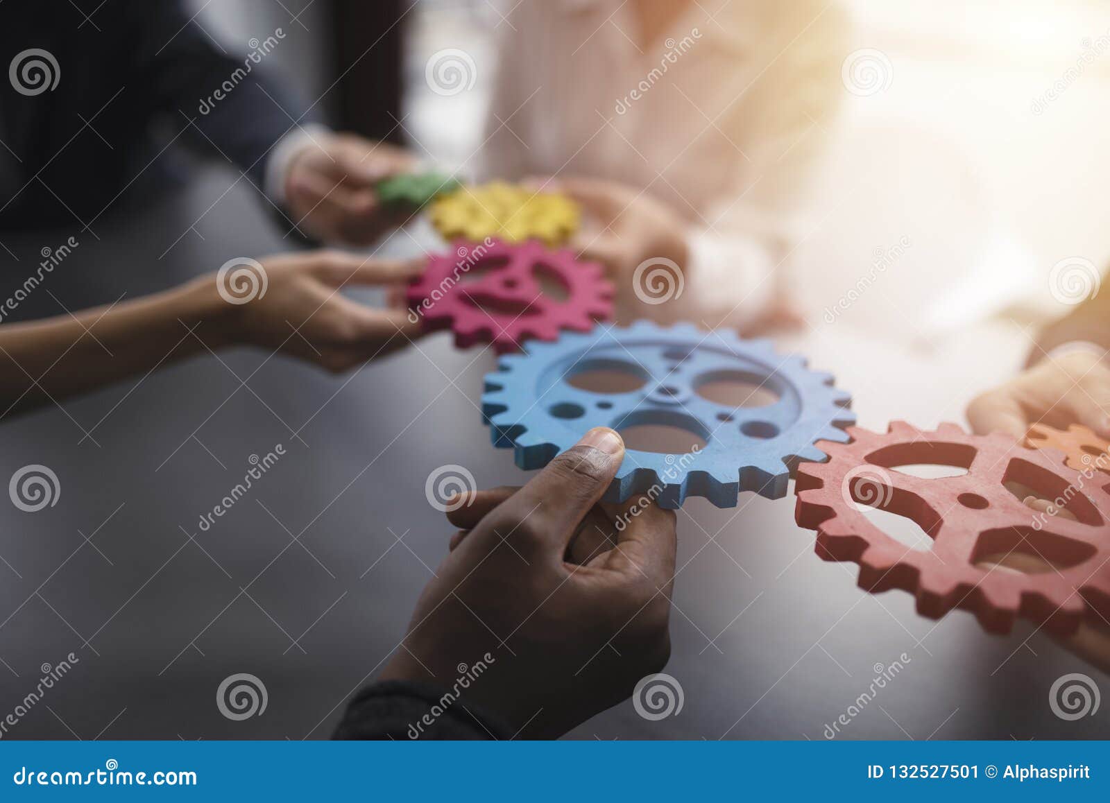 business team connect pieces of gears. teamwork, partnership and integration concept