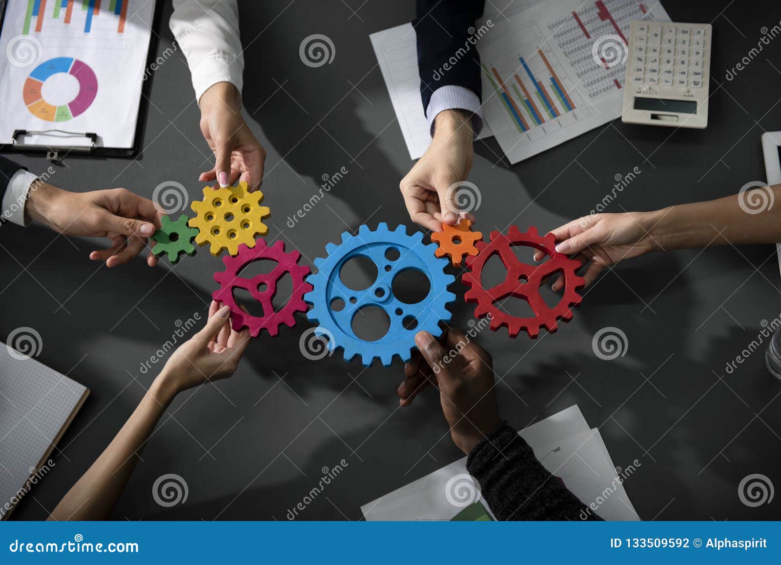 business team connect pieces of gears. teamwork, partnership and integration concept