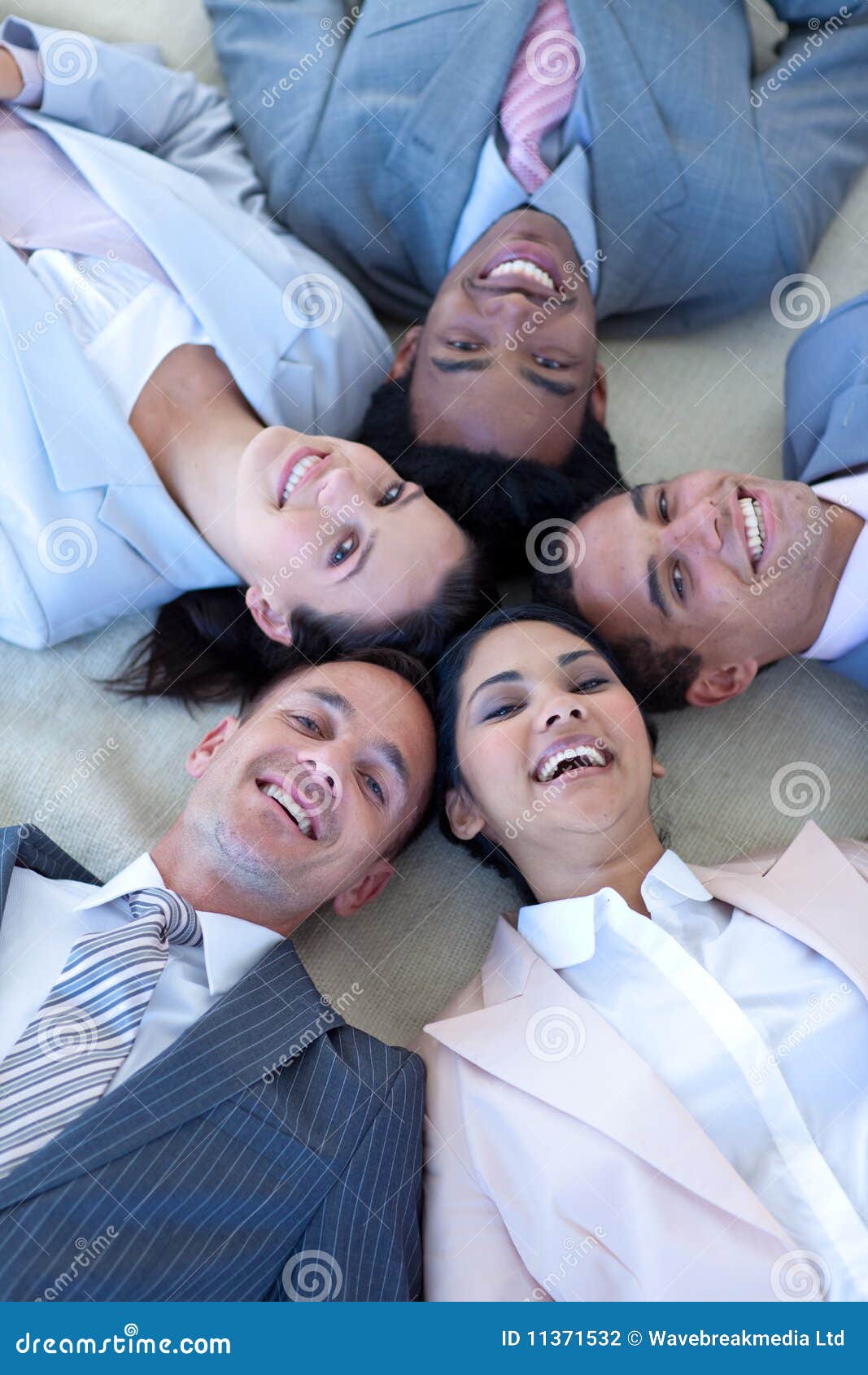 Business Team on Floor in a Circle Stock Photo Image of male, friends