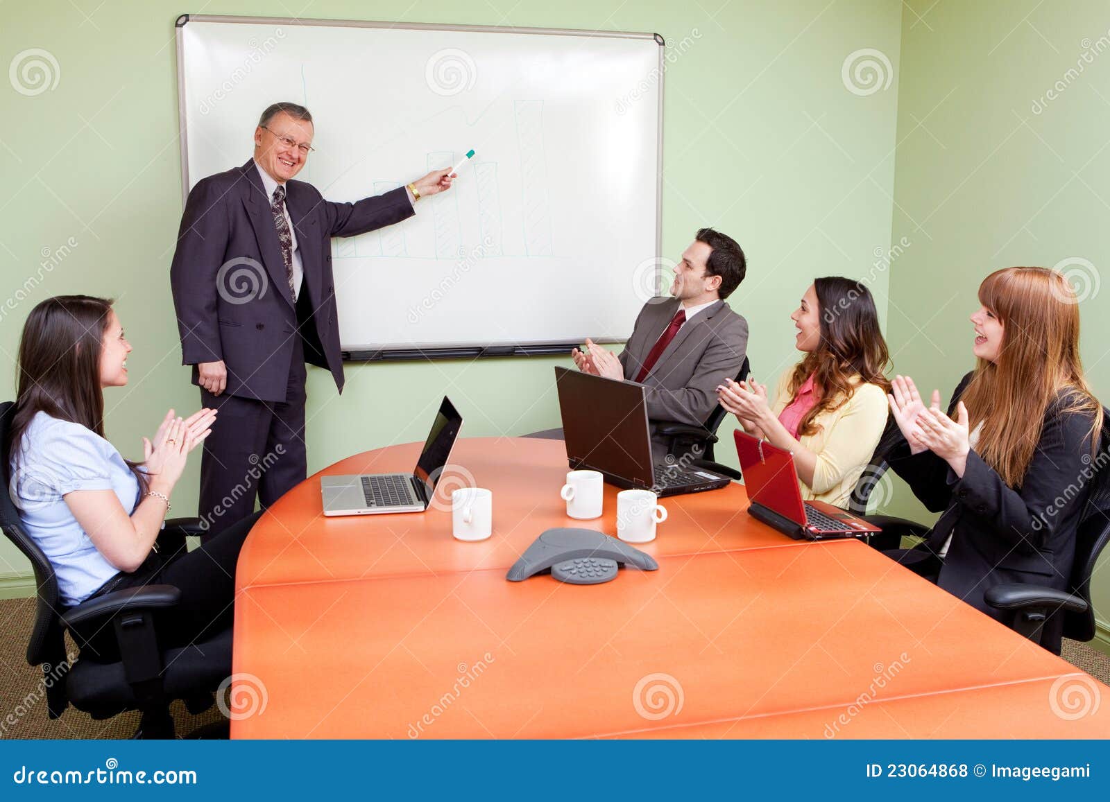 business team motivated by positive presenter
