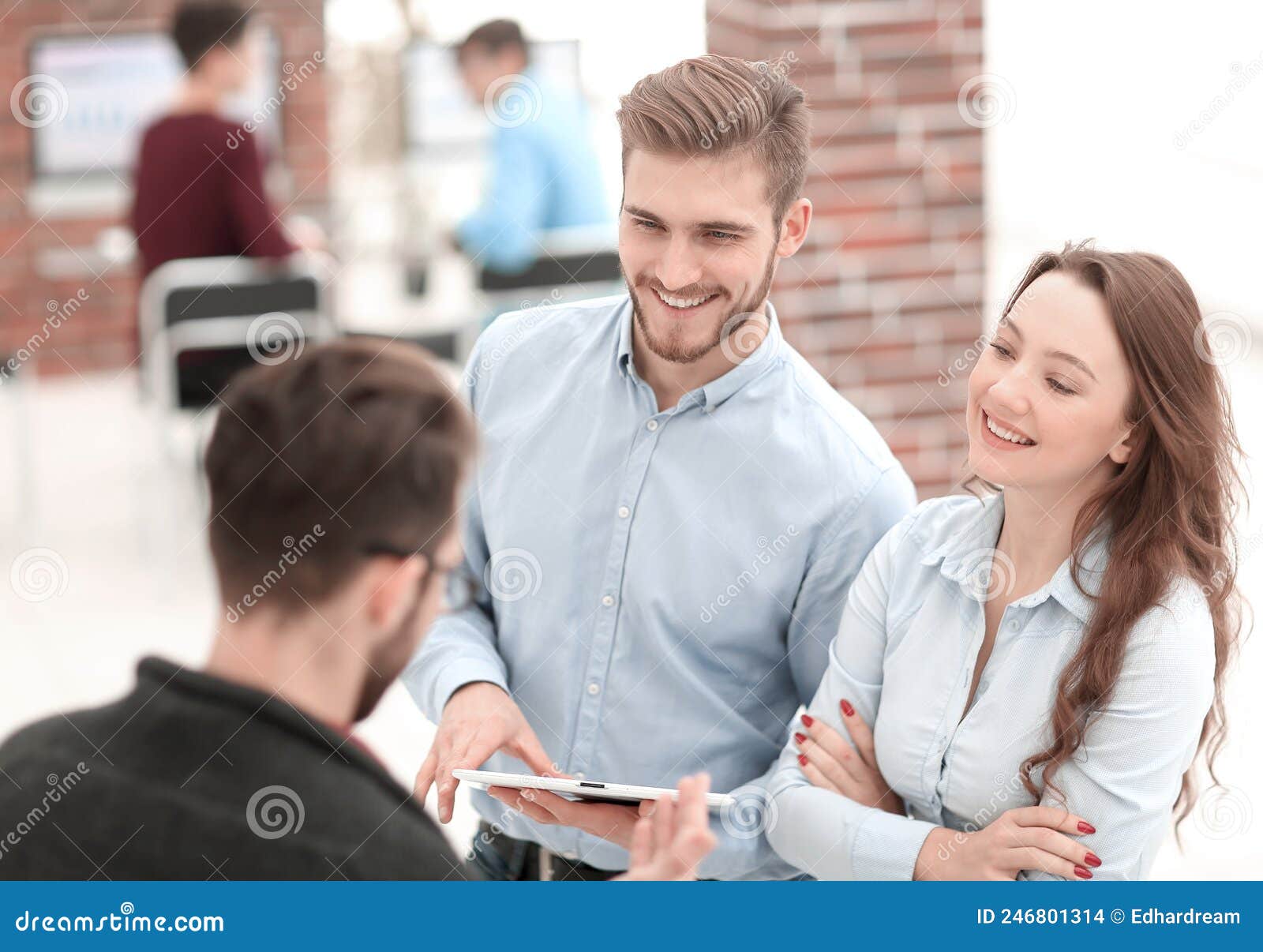 business team with tablet in office.