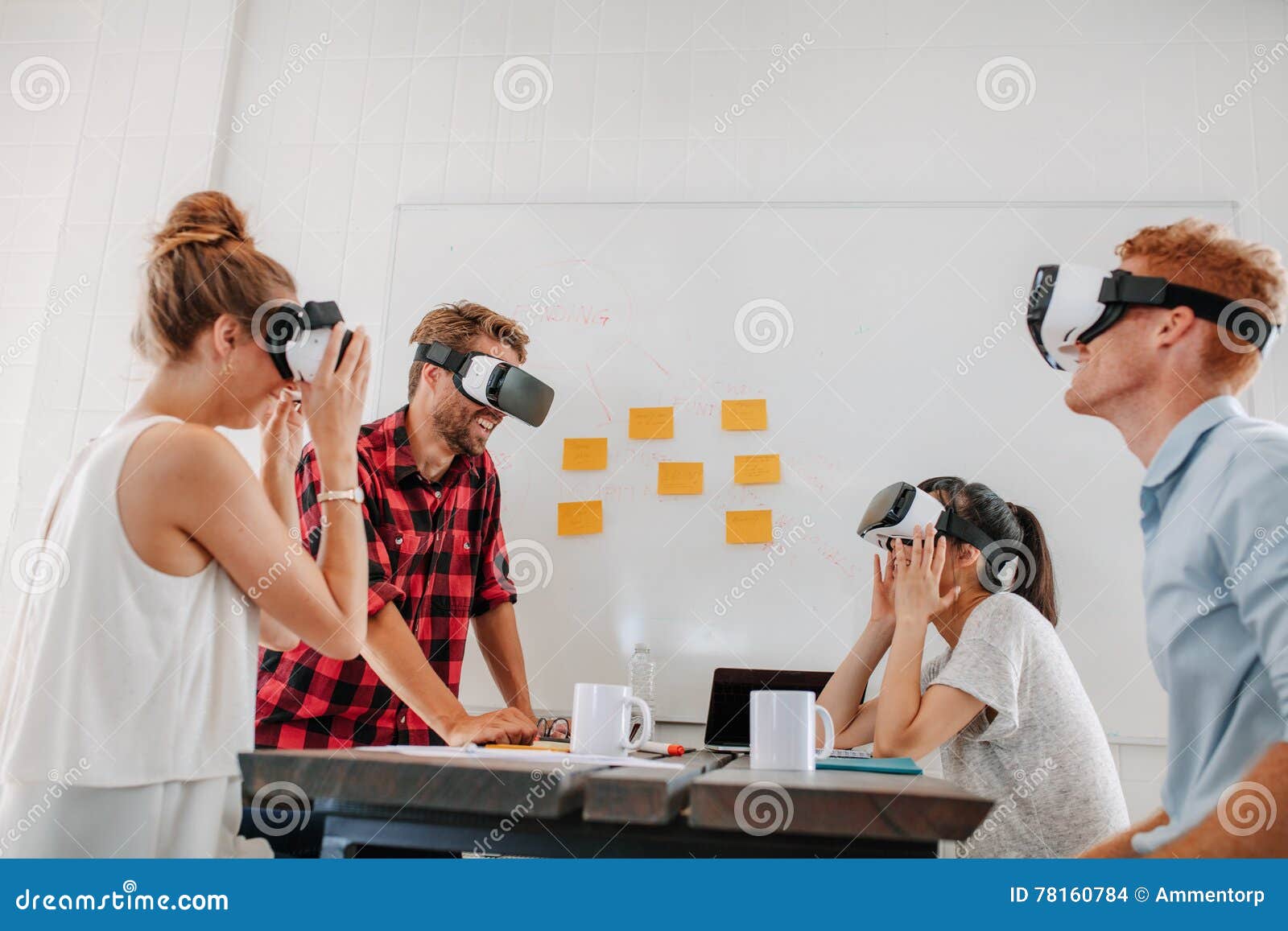 Business Team Using Virtual Reality Headset in Meeting Stock Photo