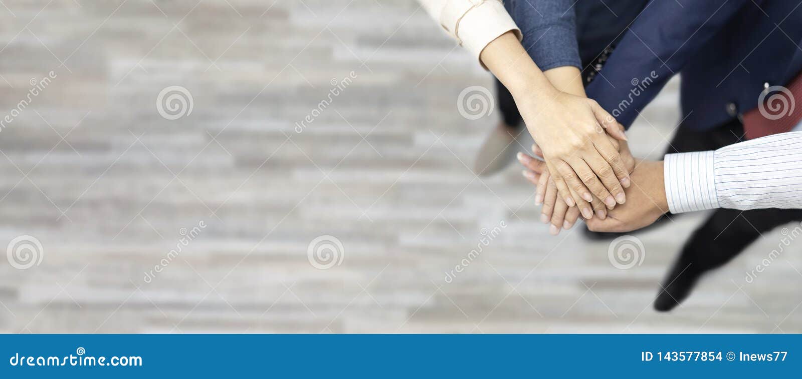business teamwork groups people hands, stacked huddle together, showing unity and teamwork. top view and copy space
