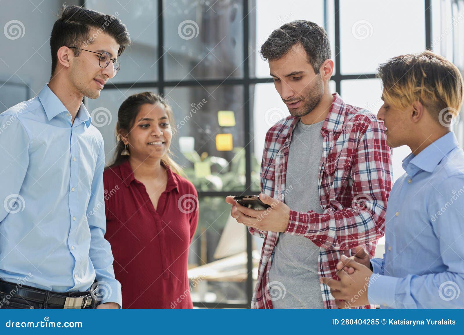 Business and Technology Concept Smiling Business Team with