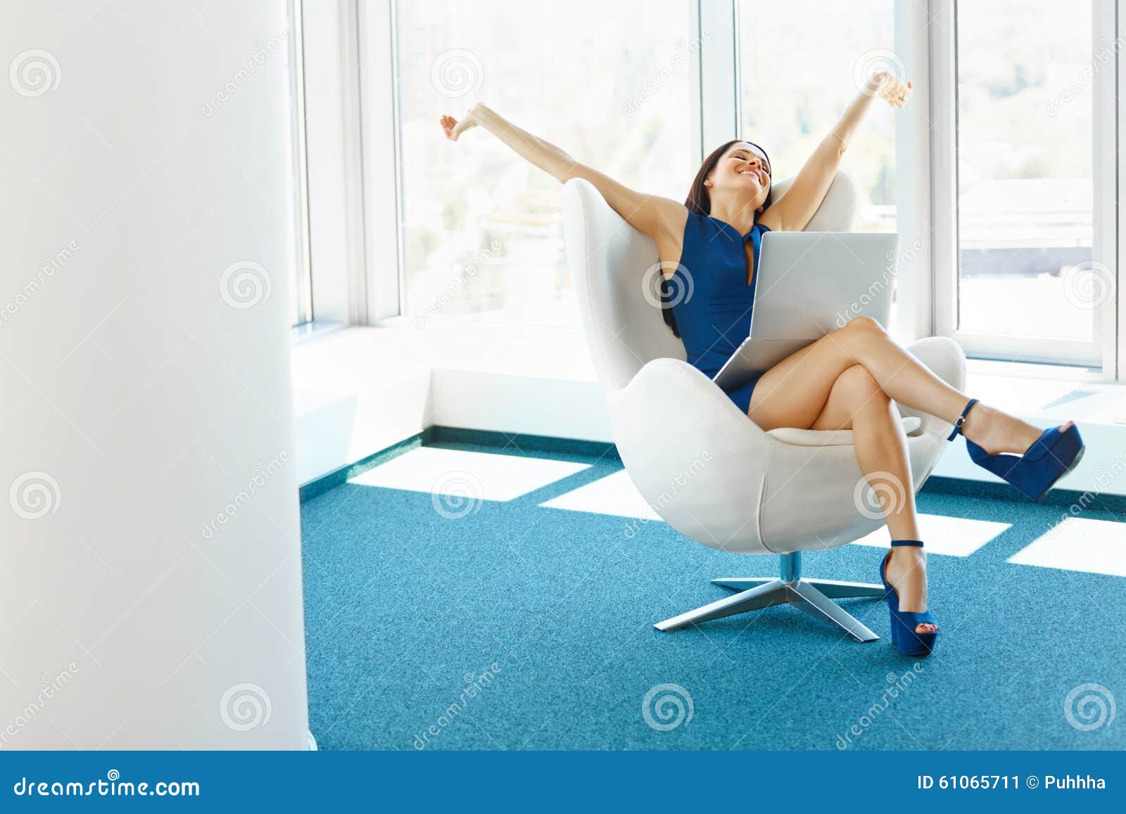 business woman celebrates successful deal at office. bussiness p