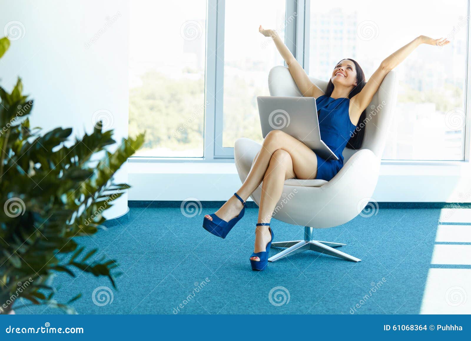 business woman celebrates successful deal at office. bussiness p