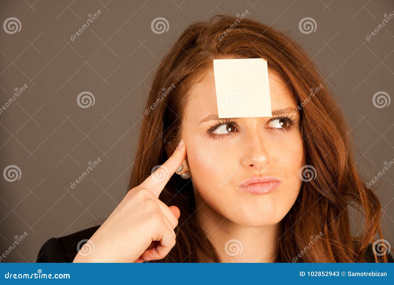 Business Woman with a Sticker on Her Forehead Stock Image Image of
