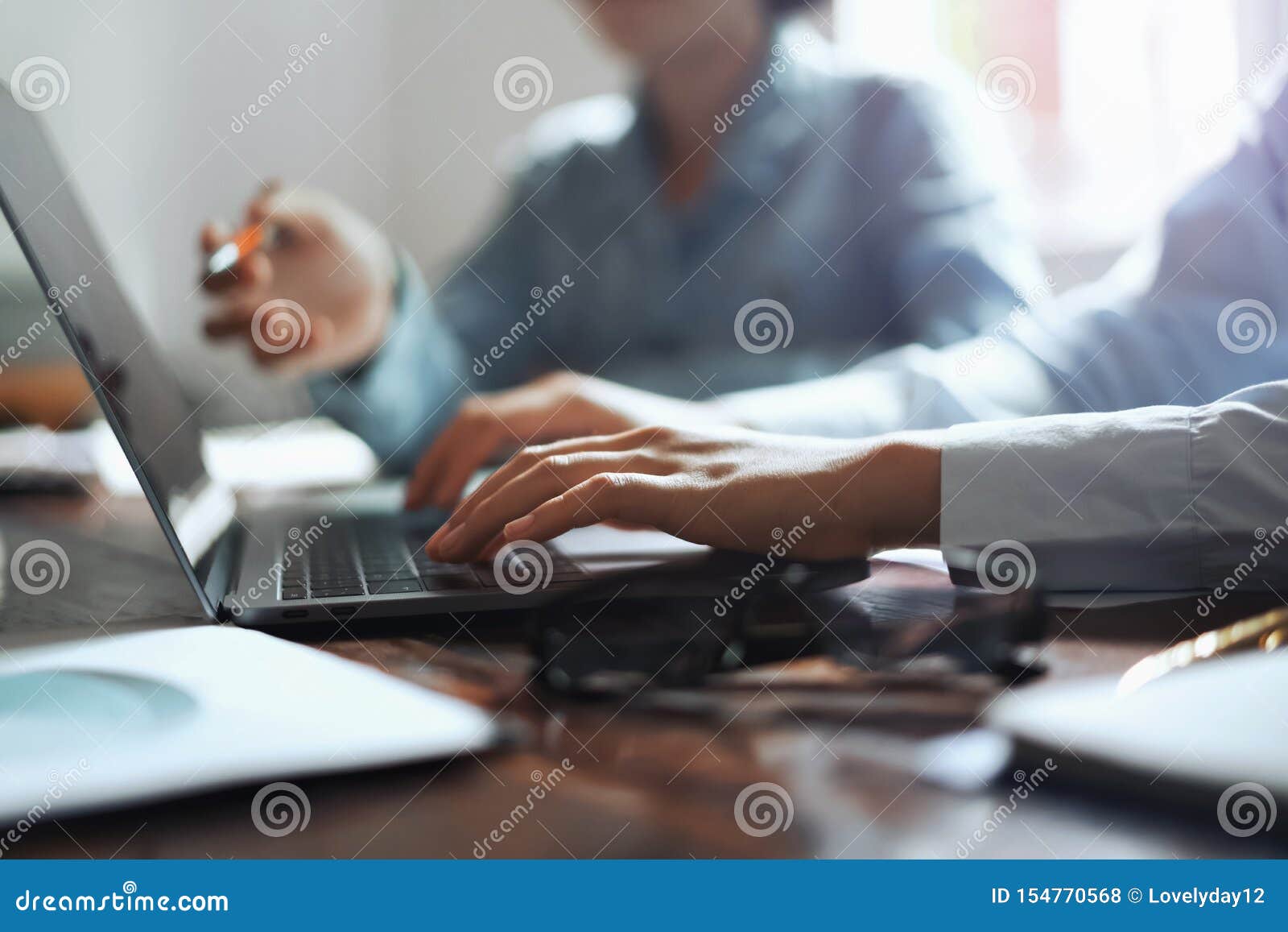 business woman using laptop hand typing on keyboard for meeting team in office. finance and accounting concept