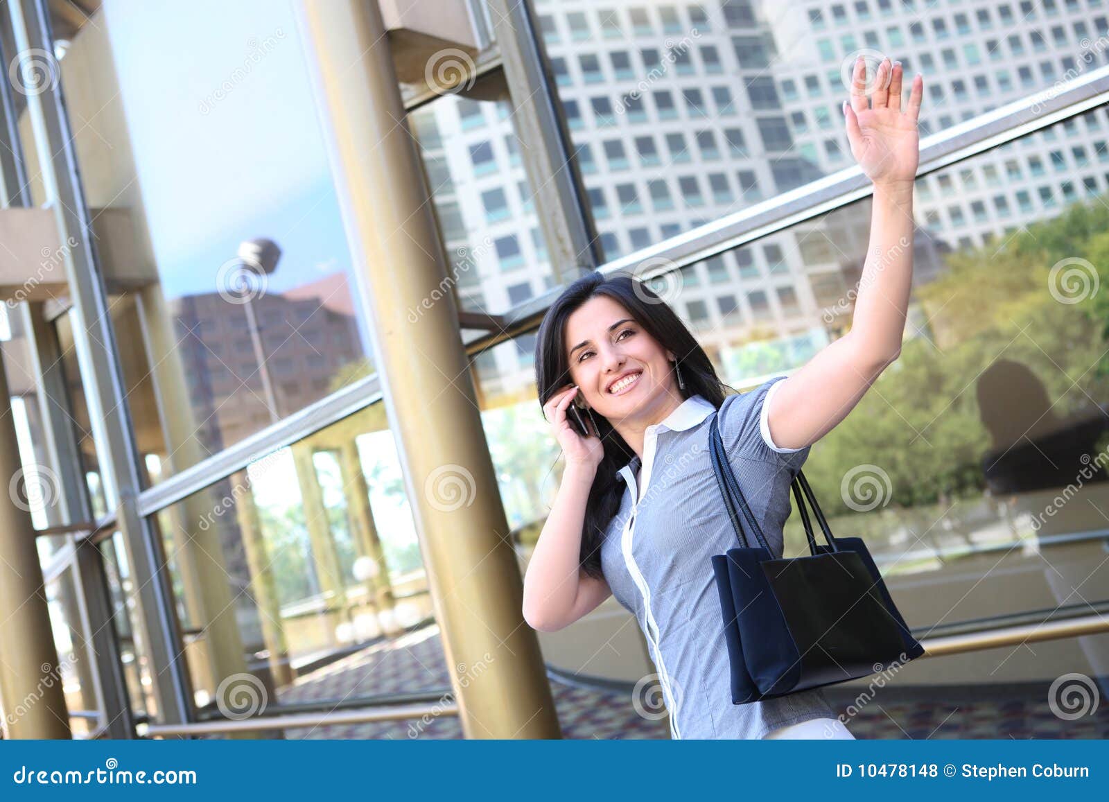 business woman waving goodbye