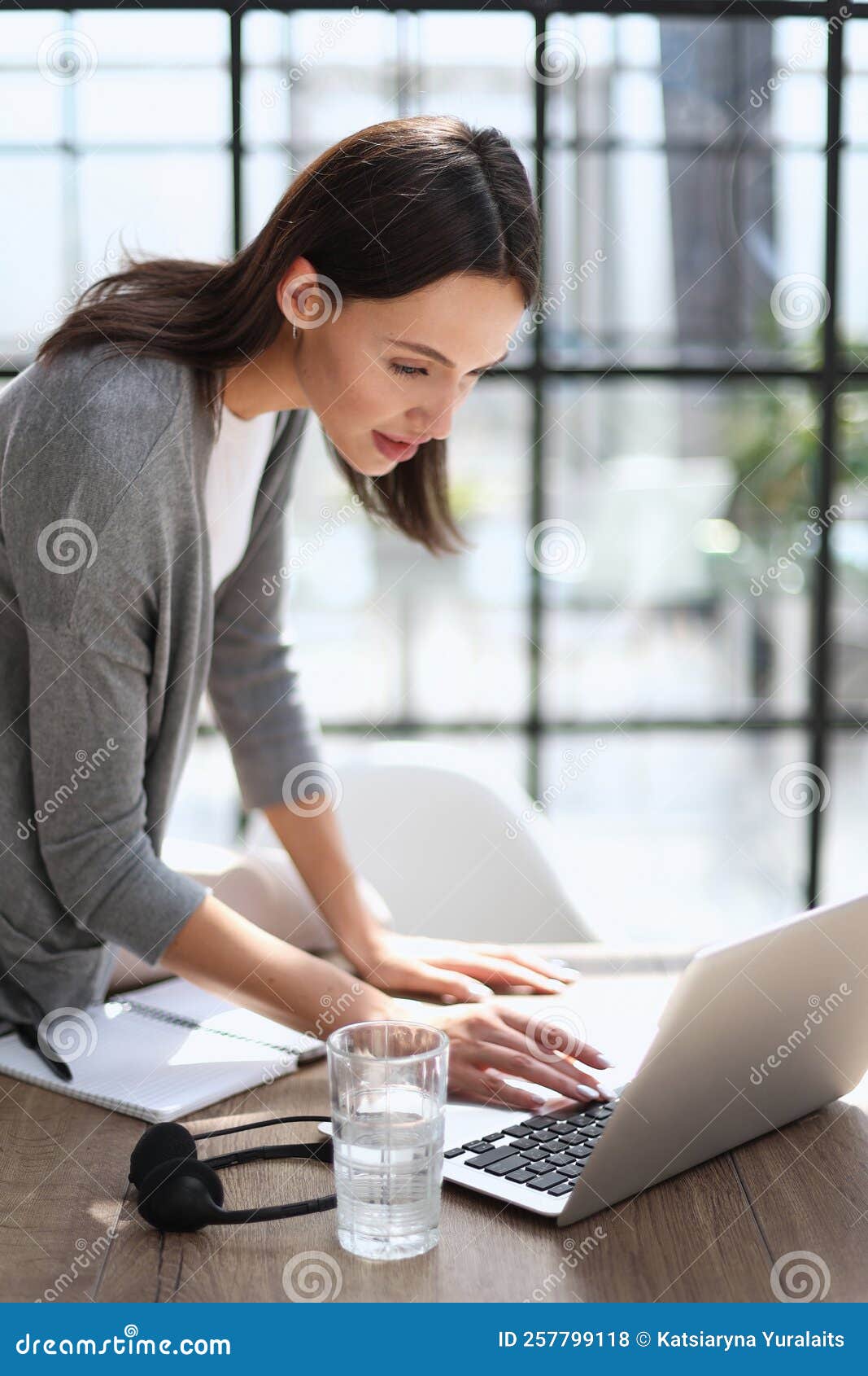 business woman working on laptop computer in office