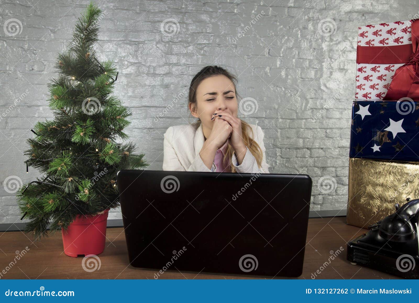business woman yawns at work, overtired organism
