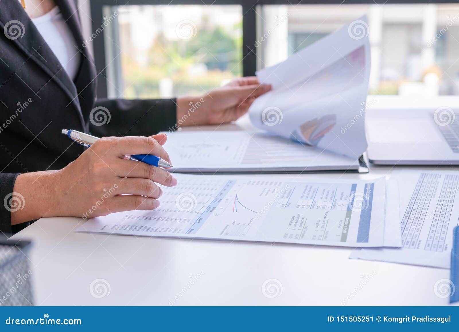 businessman analysis comparing financial reports