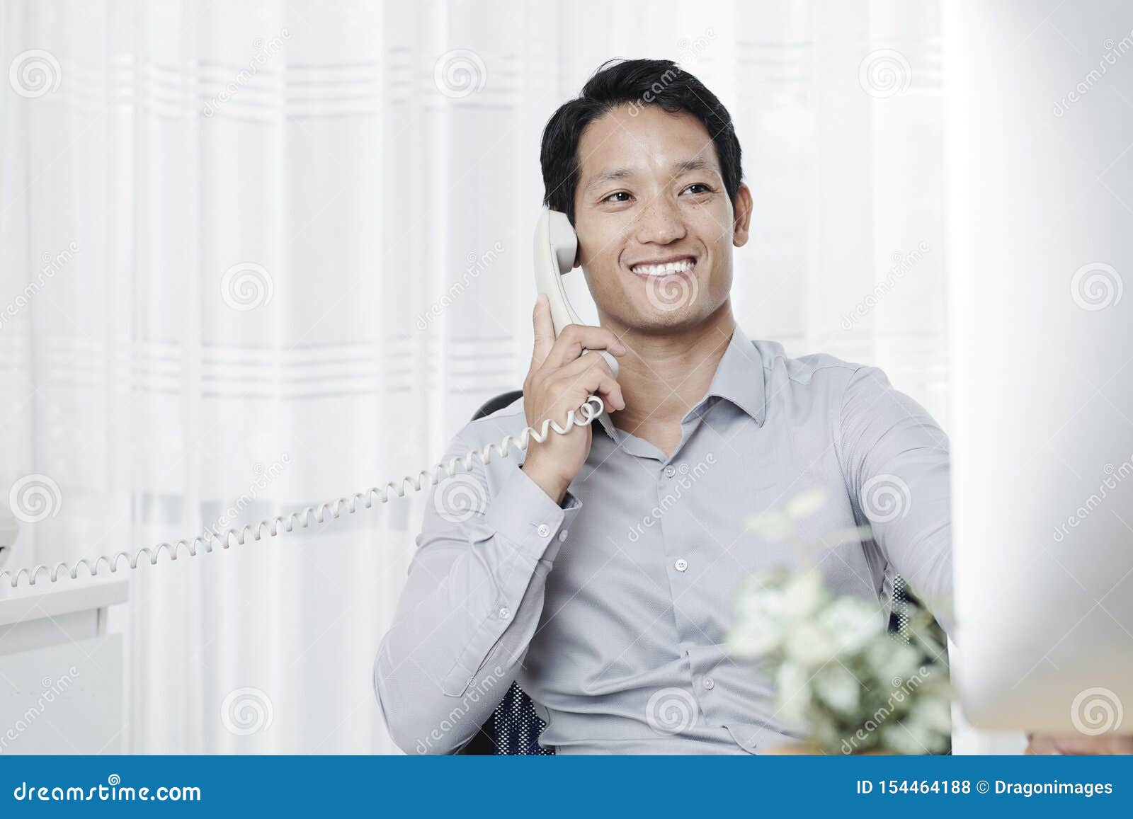 Businessman Answering Phone Call Stock Photo - Image of males