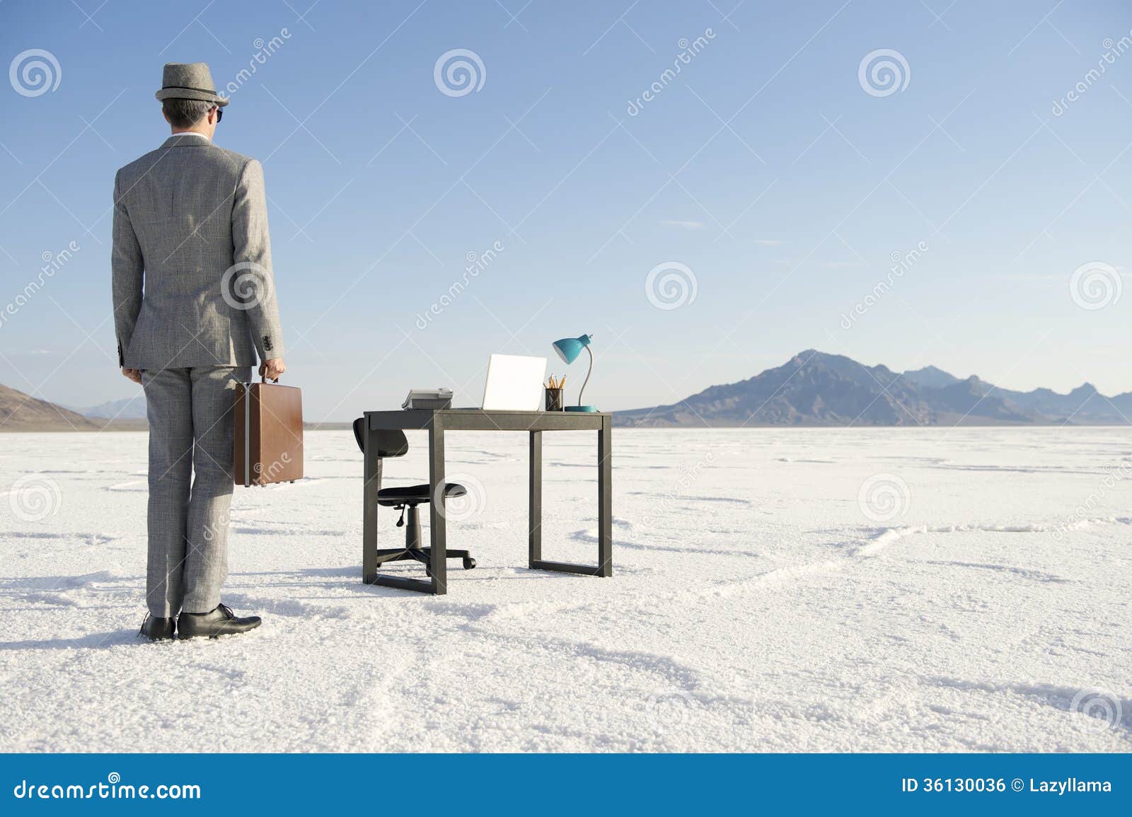 businessman arriving at mobile office desk outdoors