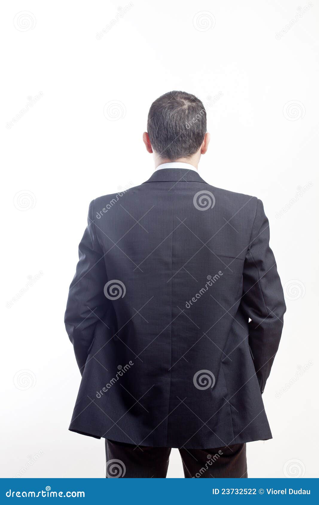 Businessman from the back stock photo. Image of rear - 23732522