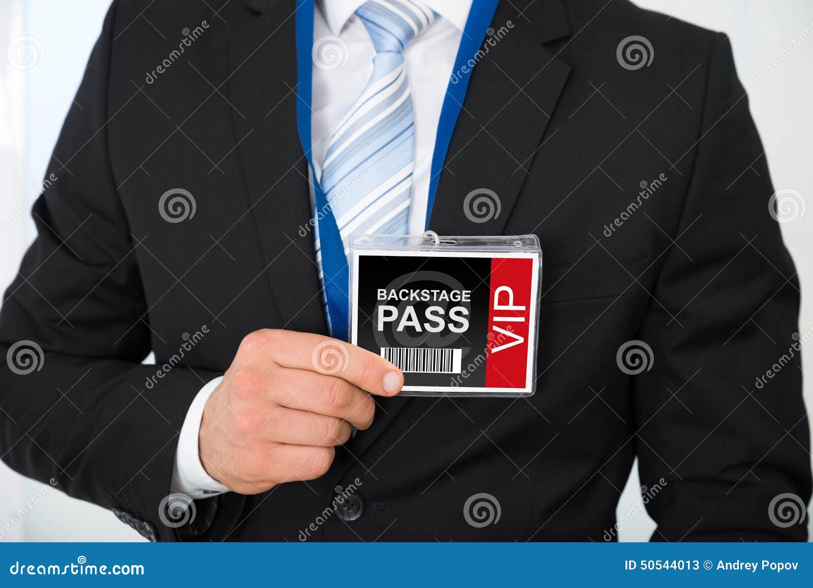 businessman with backstage pass