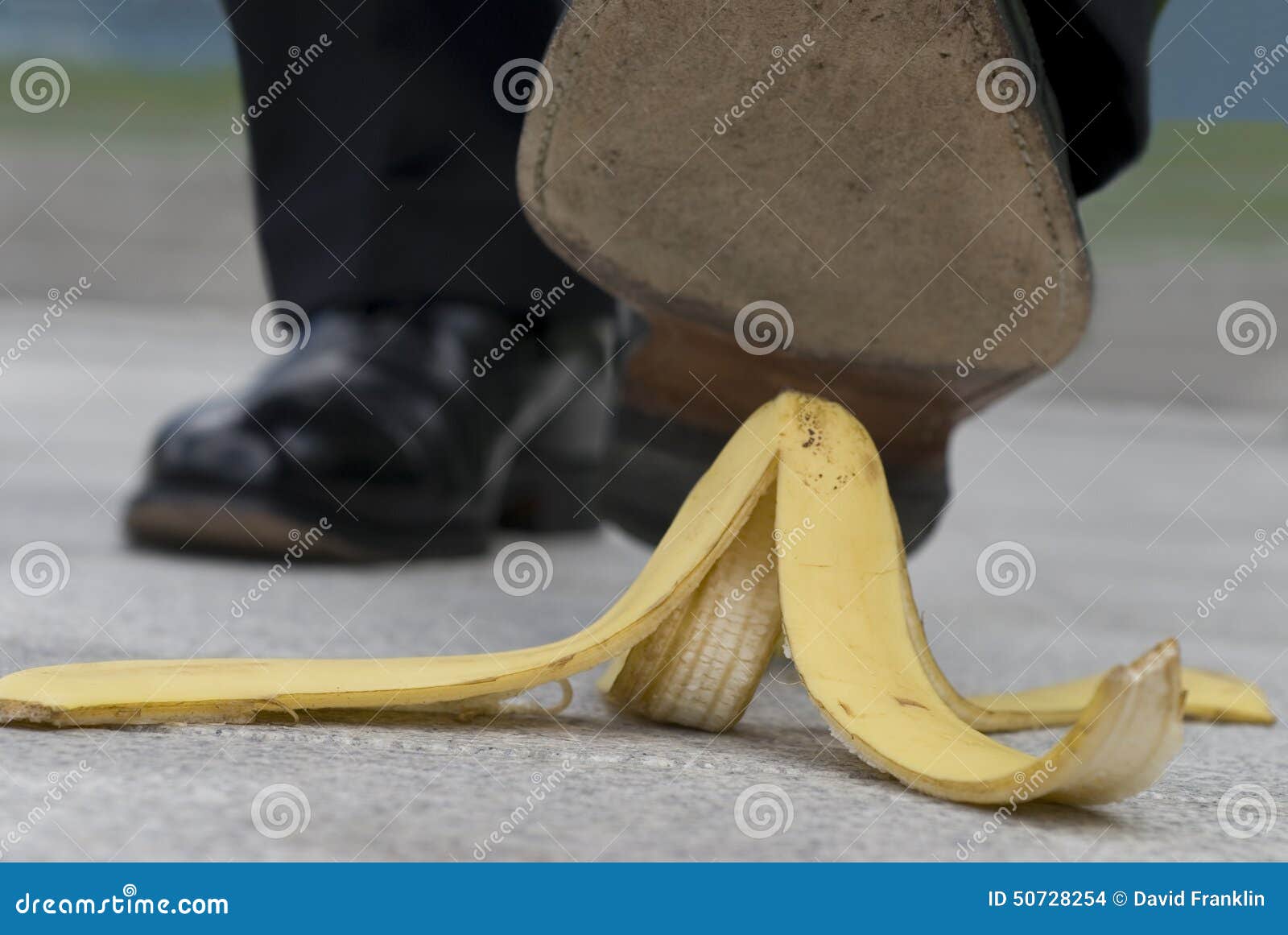 Banana Peel Accident : Businessman Stepping On Banana Skin Stock Photo ...