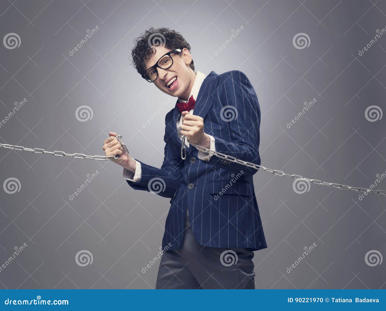 Businessman breaking chain stock photo. Image of metal 90221970