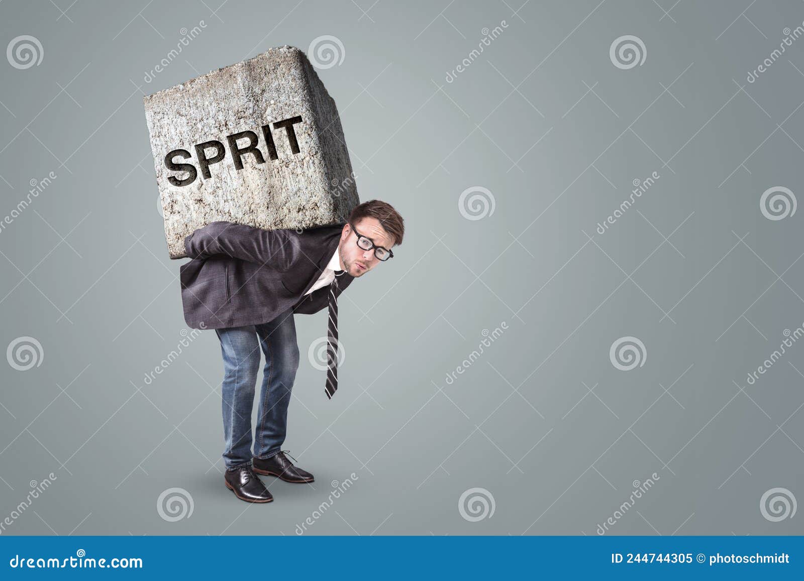 businessman burdened by a heavy stone with the german word sprit on it