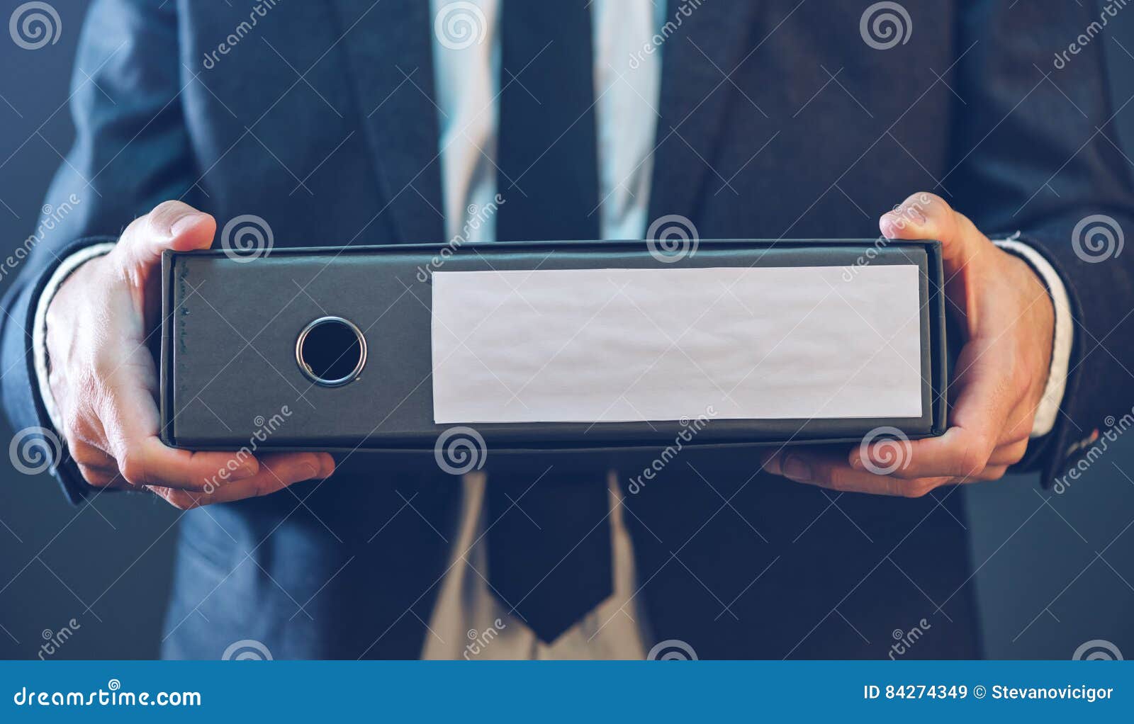 Businessman with Corporate Files in Document Binder Stock Image Image