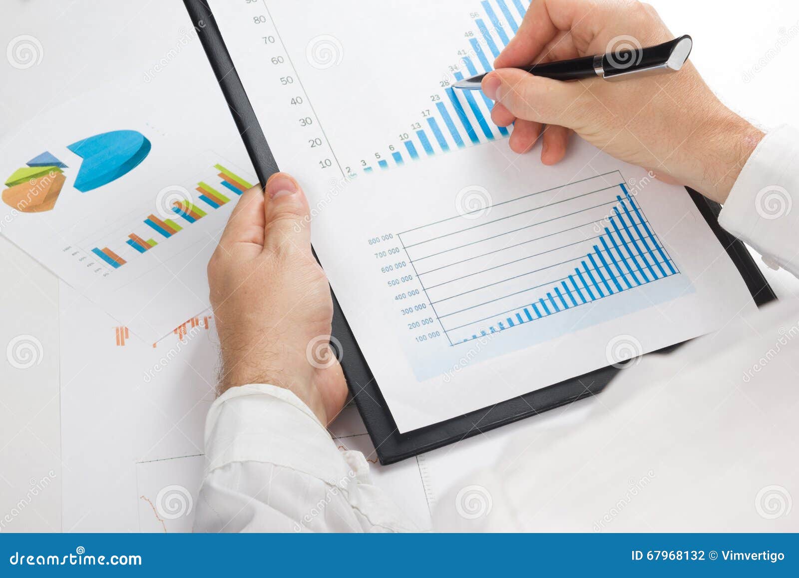 Businessman Counting Losses And Profit Working With Statistics