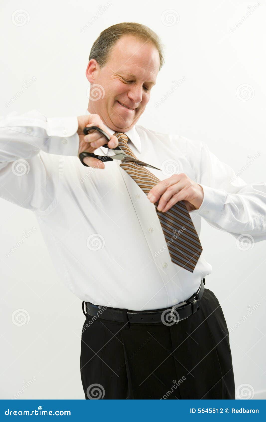 Businessman cutting tie stock photo. Image of weird, caucasian 5645812