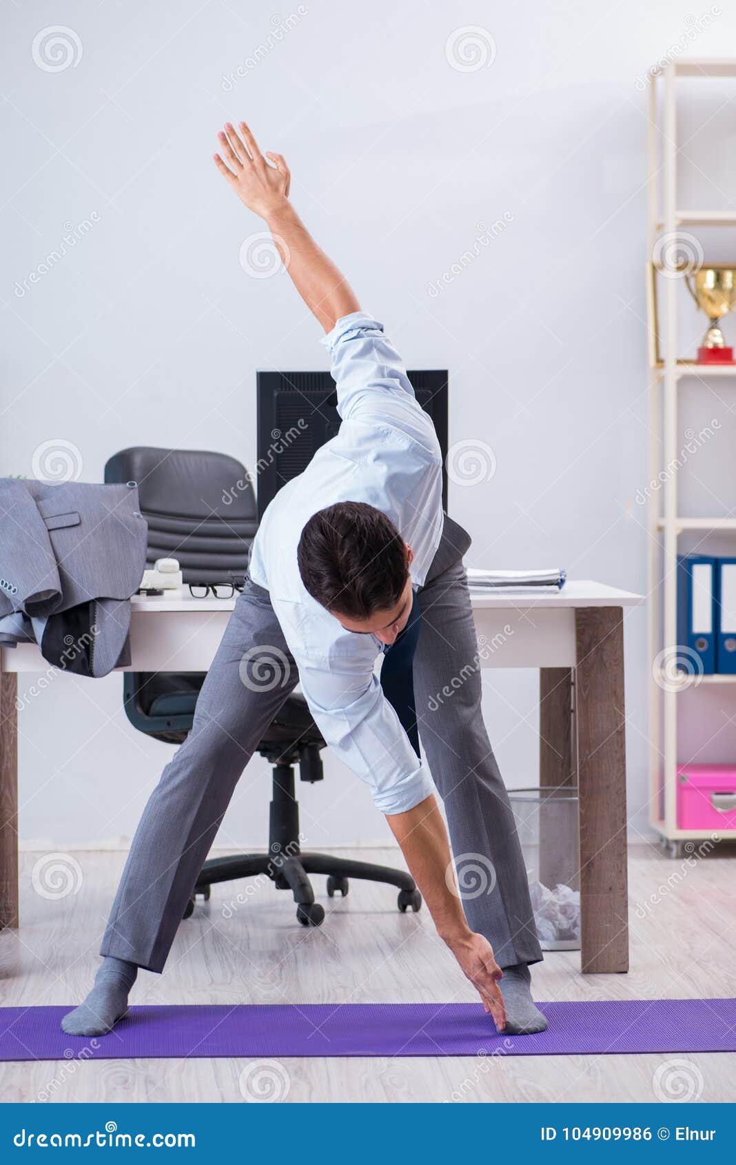 The Businessman Doing Sports in Office during Break Stock Photo Image