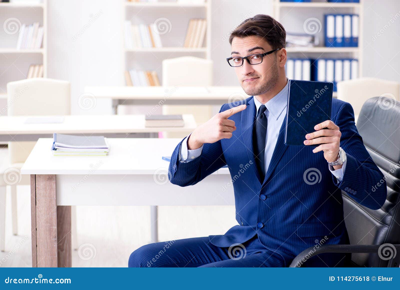 The Businessman in Executive Education Concept with Book Stock Photo