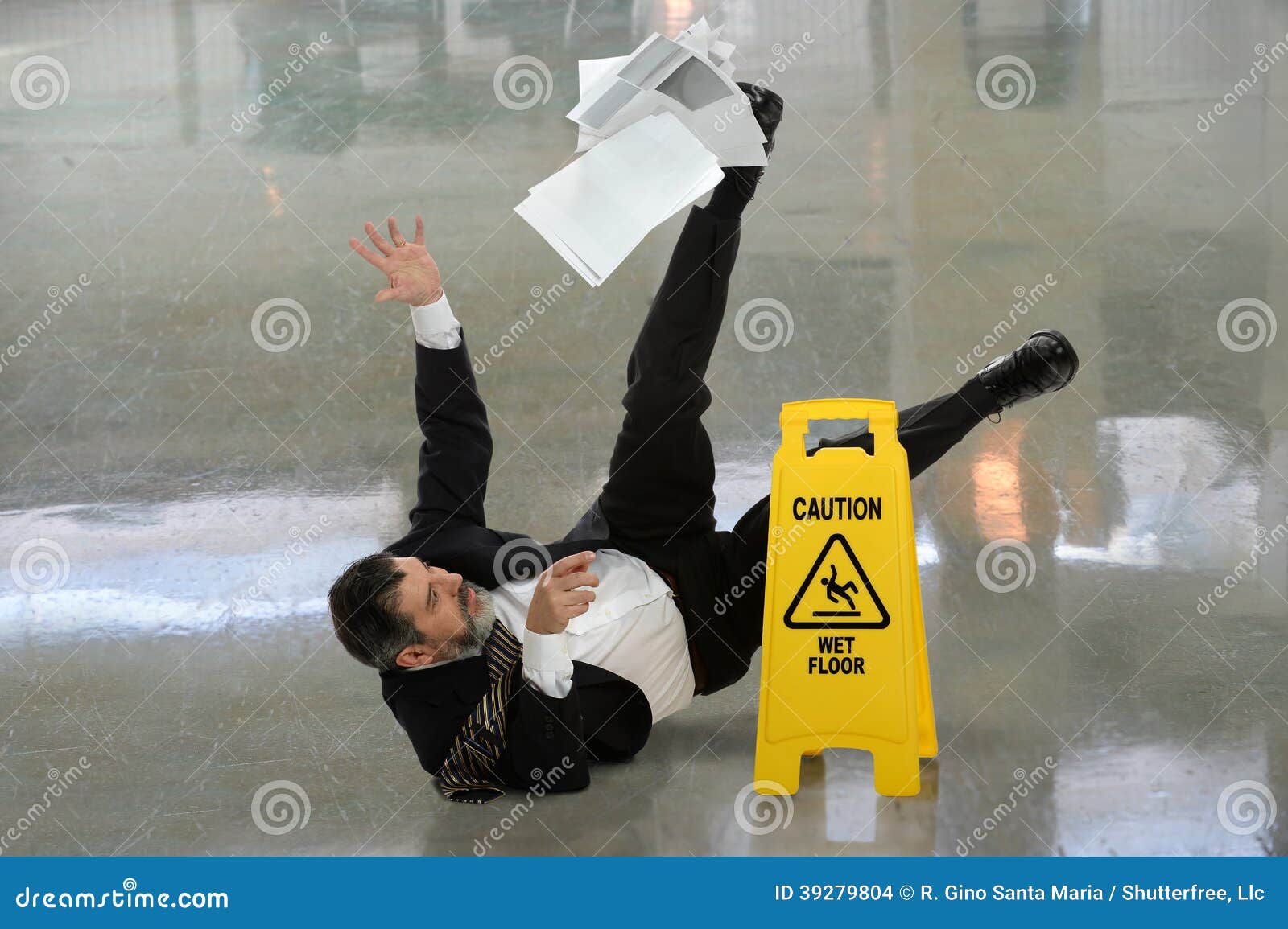 businessman falling on wet floor