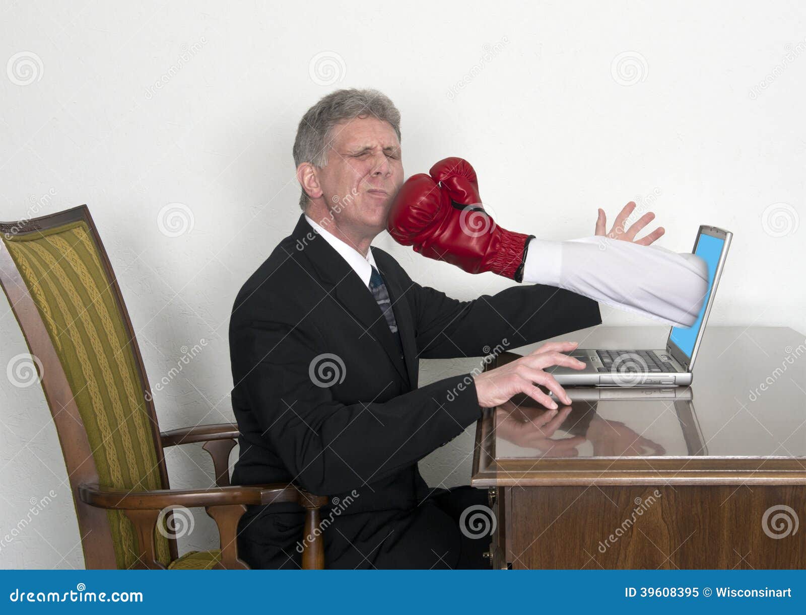 Businessman Gets Surprise Punch From Laptop Stock Photo ...