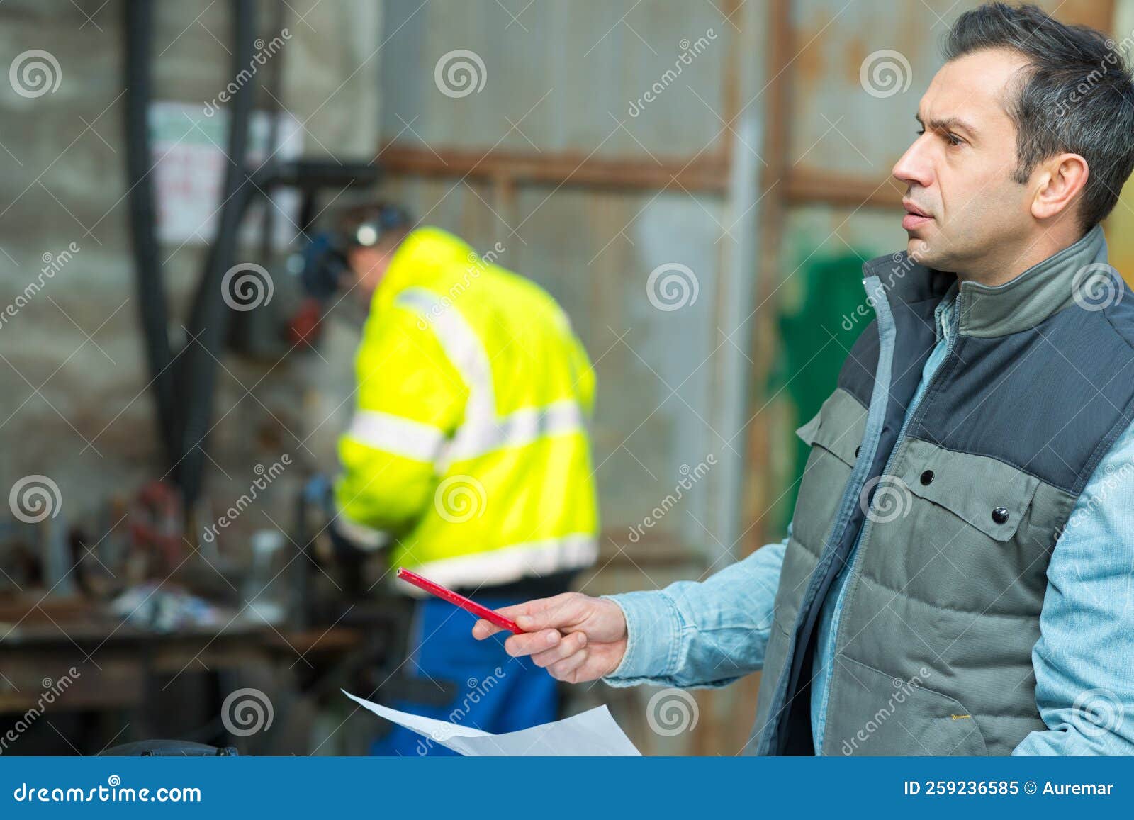 Businessman Giving Directions at Warehouse Stock Image Image of