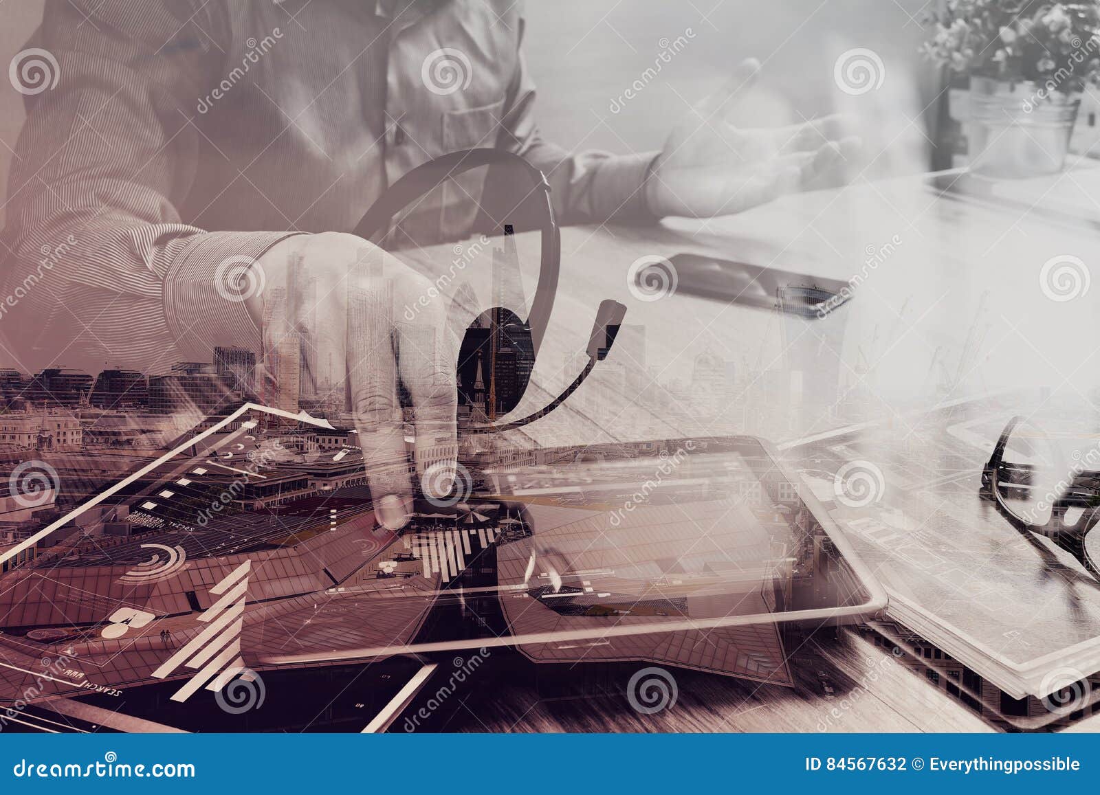 businessman hand using voip headset with digital tablet computer