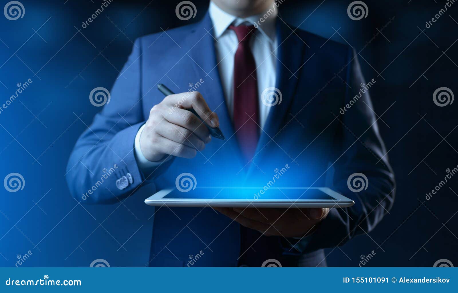 businessman holding digital tablet. man using gadget in office
