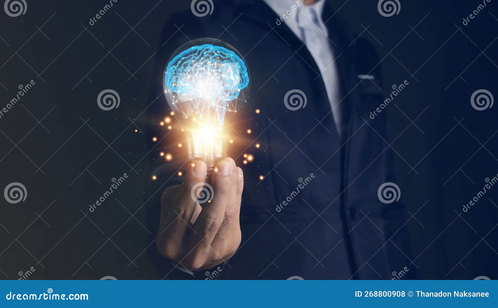 businessman holding a light bulb and brain inside,creative and inspiration,idea and imagination scientific innovation with network