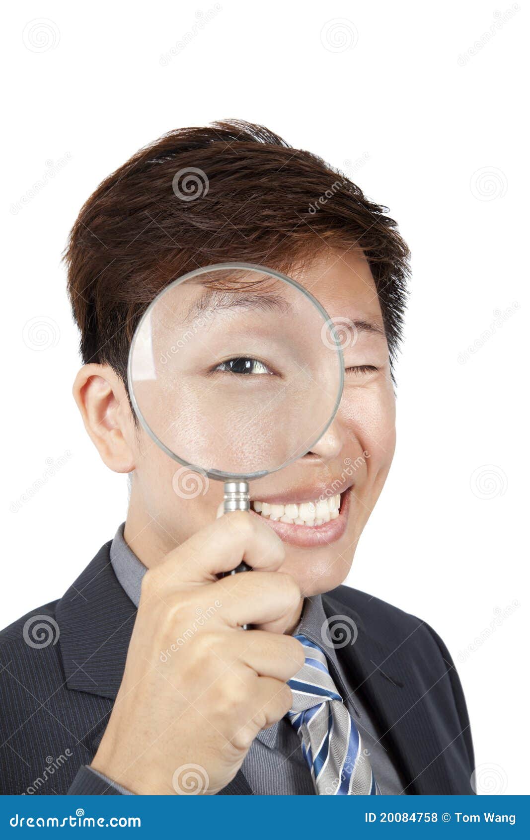 Businessman Holding Magnifier Stock Photo Image of face, interest