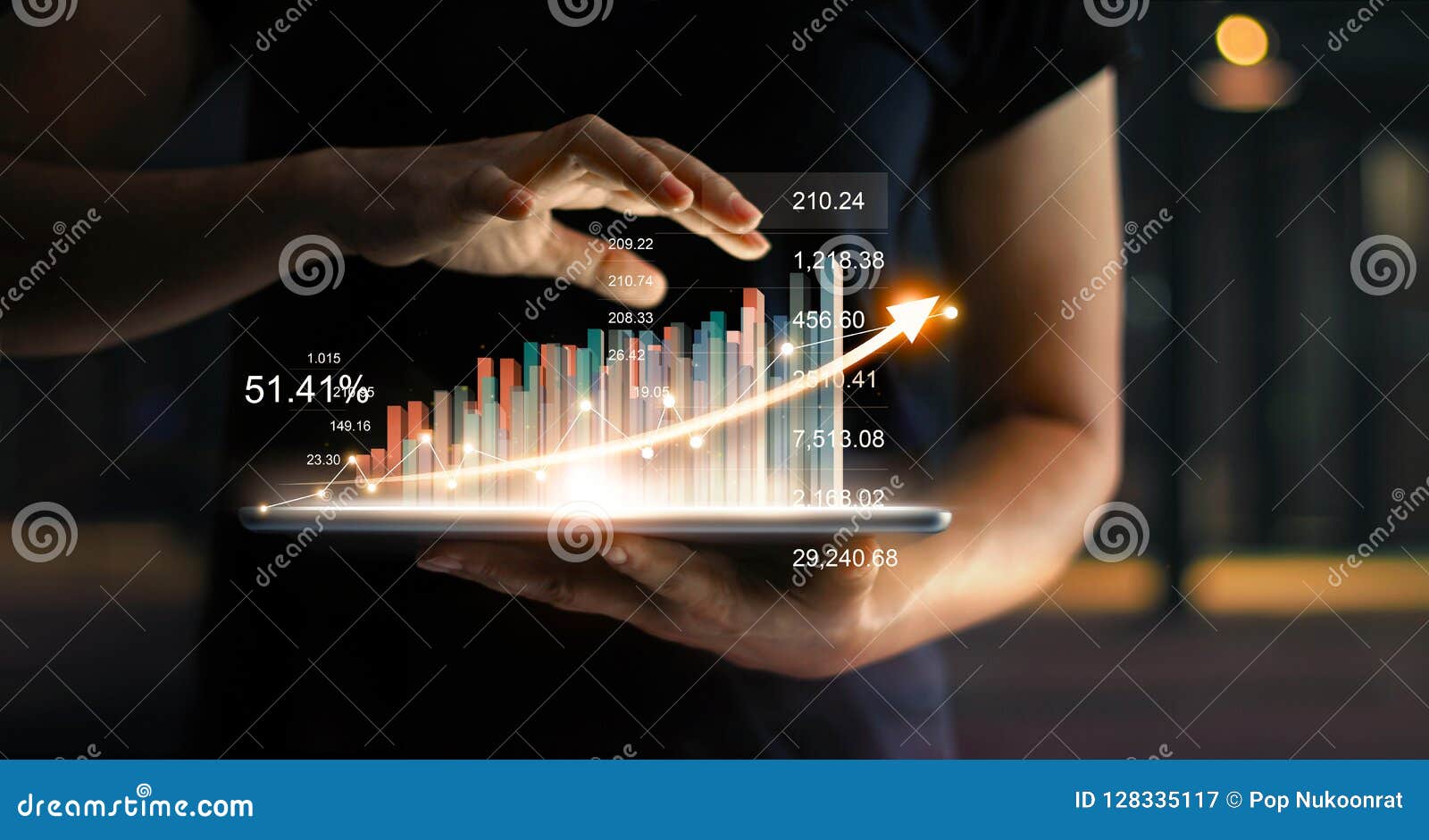 businessman holding tablet showing virtual hologram statistic