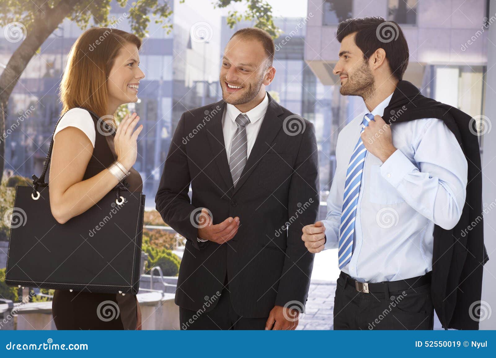 businessman introducing new partner to colleague