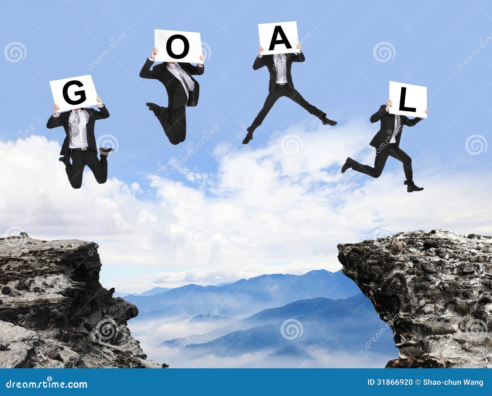 businessman jumping with goal text on danger precipice