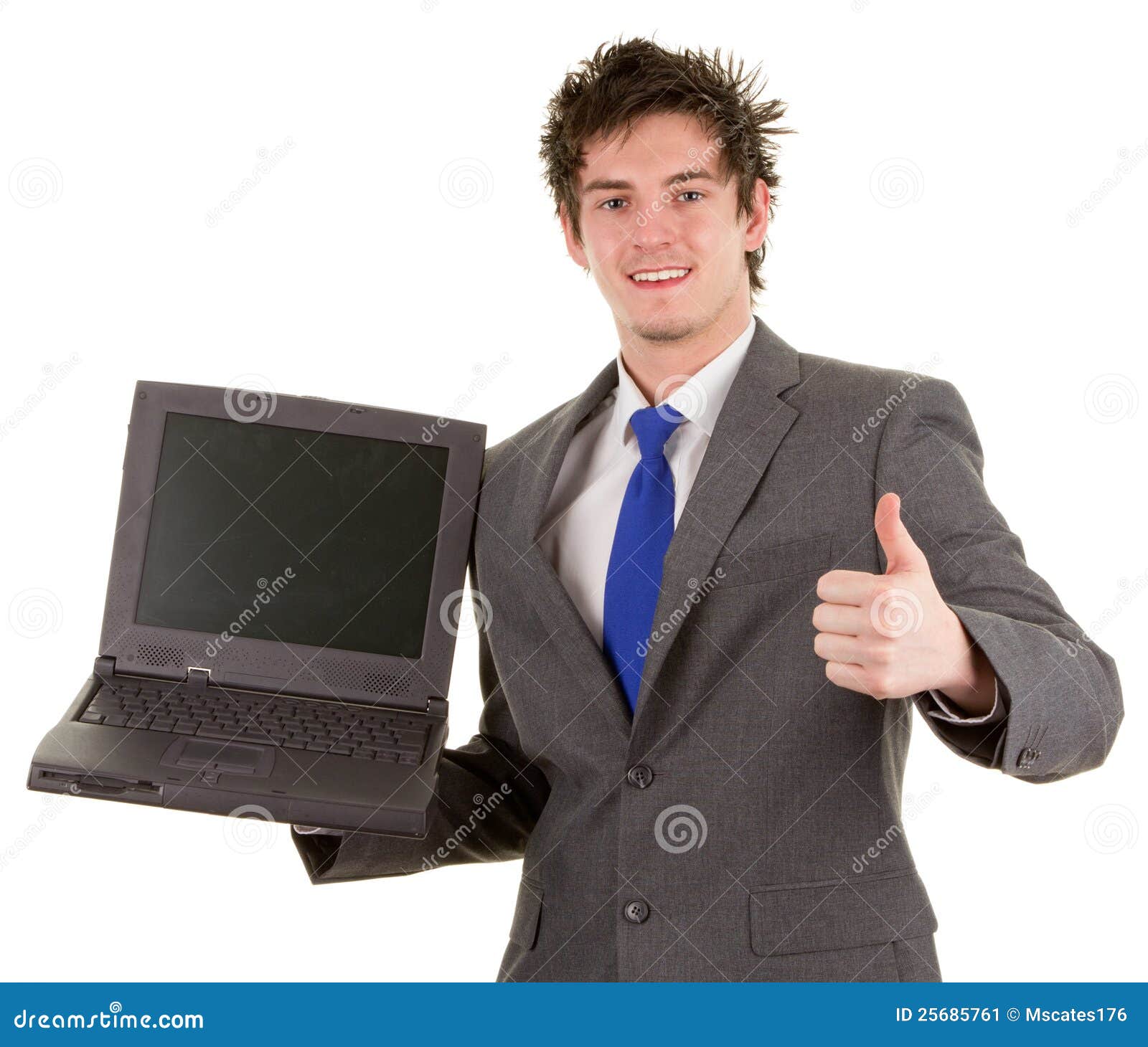 Businessman with a laptop. A business worker holding a laptop, showing a thumbs up sign, isolated on white