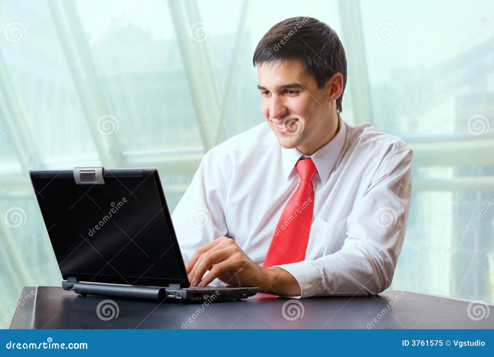 Businessman with laptop stock image. Image of businesspeople 3761575