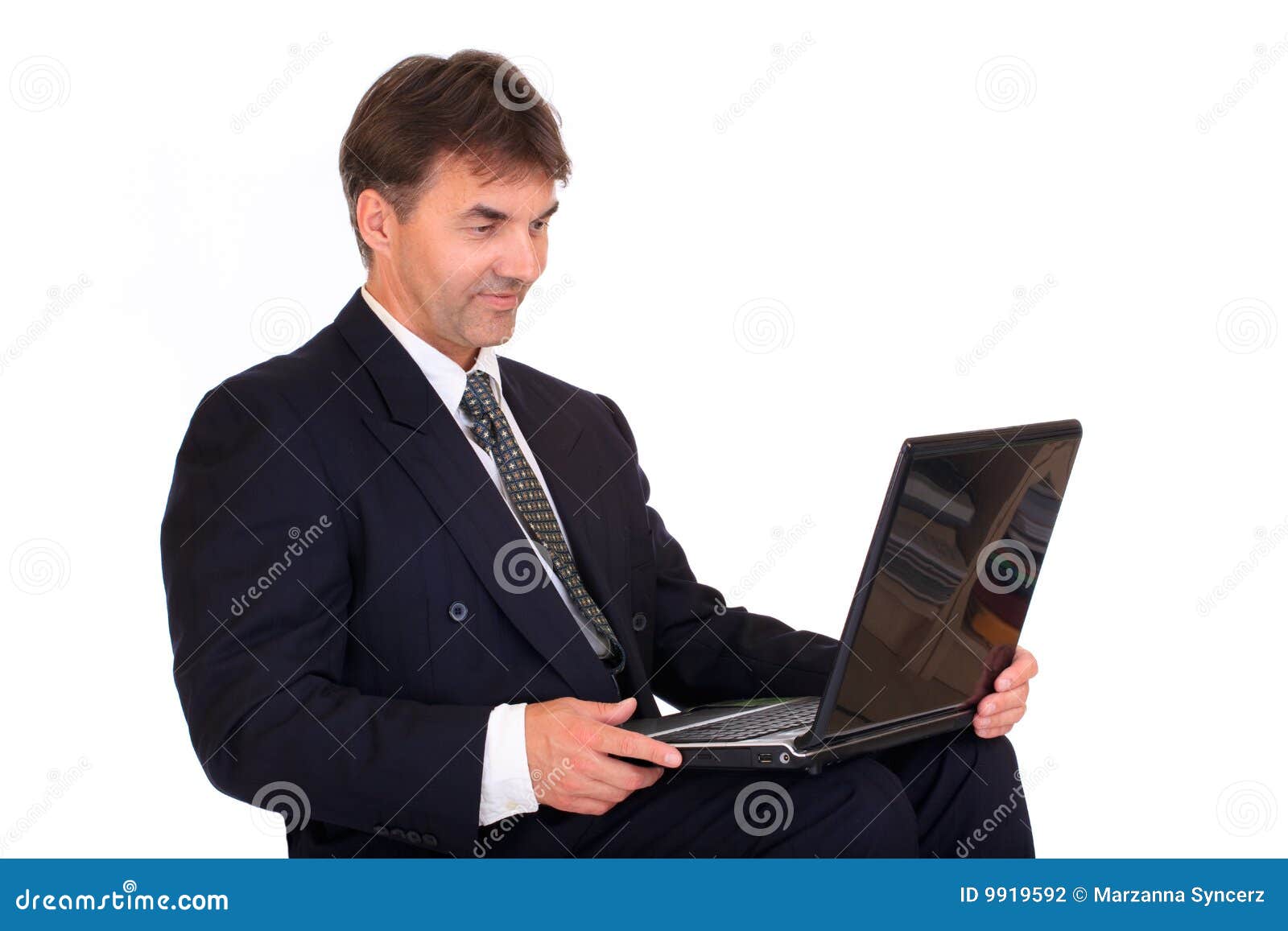 Businessman with laptop stock photo. Image of looking 9919592