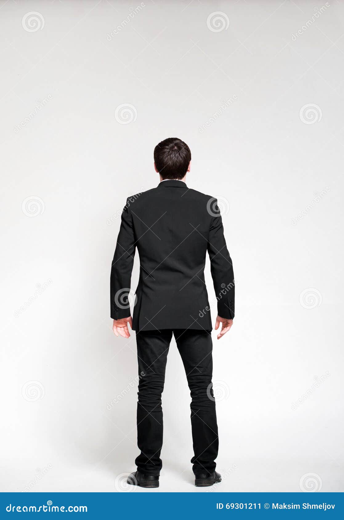 Businessman Looking on Empty Wall Stock Image - Image of clerk, looking ...