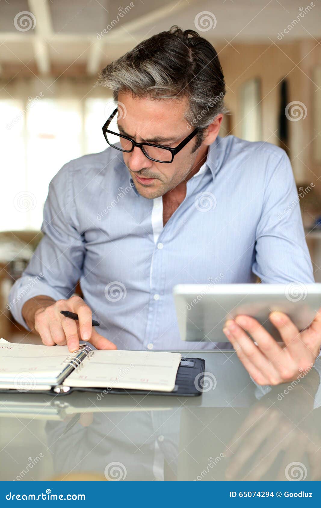 Businessman Making Appointments at Home Stock Photo Image of